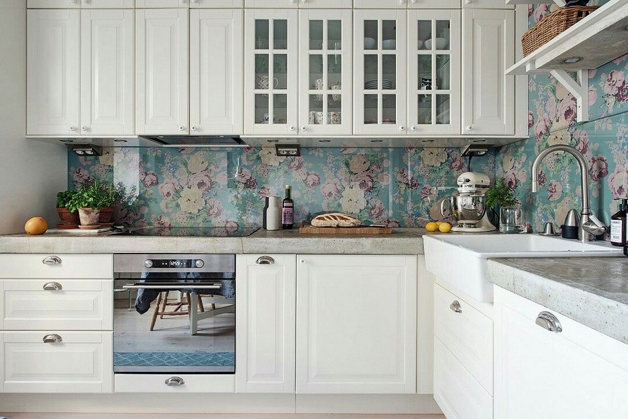 Paper wallpaper under the glass of a kitchen apron
