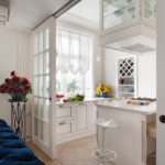 Light curtain in the kitchen with white walls