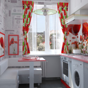 Red and white kitchen in a city apartment