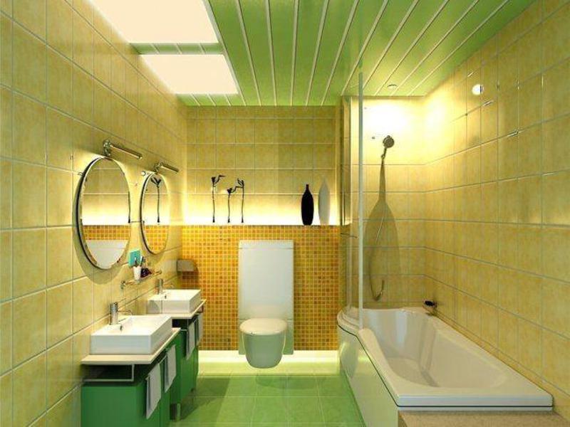 Modern bir banyo tavanında açık yeşil PVC paneller