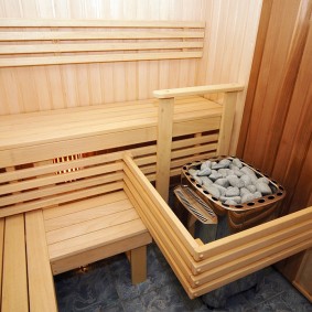 Stove guard in compact sauna