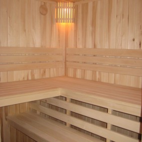Wooden shelves in a loggia sauna