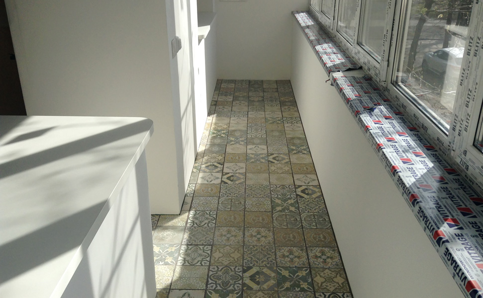 Patchwork style tiles on the loggia floor