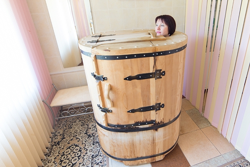 Phyto-sauna cedar barrel on a glazed loggia