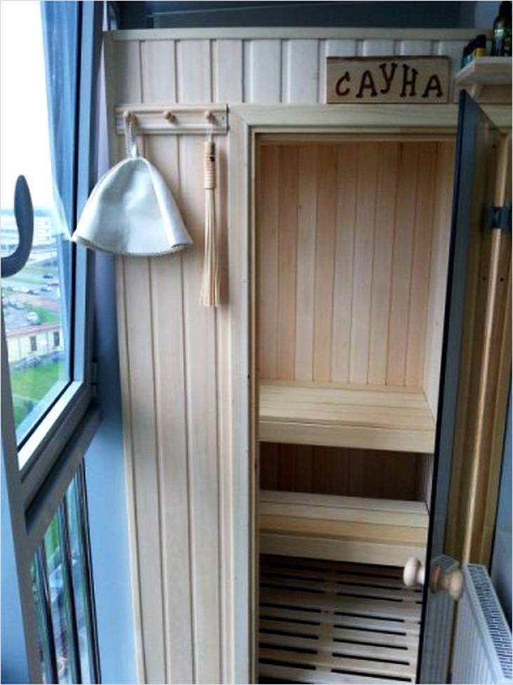 Open door to the sauna on the balcony of the apartment