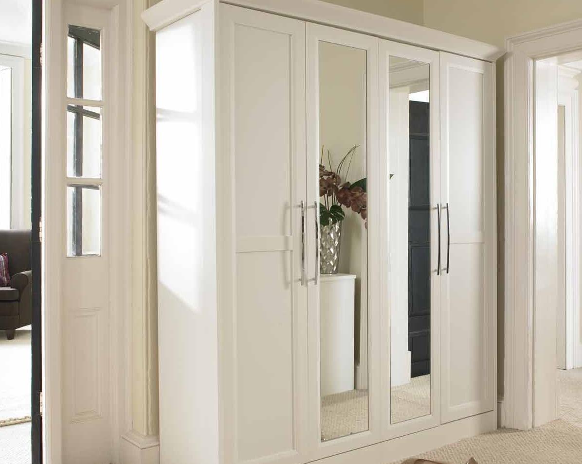 white hinged wardrobe with mirror